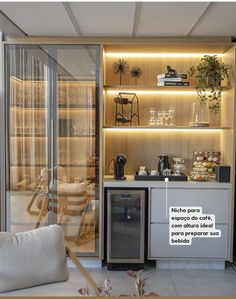 a living room filled with furniture and lots of shelves