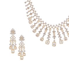 Shine during your special occasions with this designer diamond necklace set, encrusted with 904 round brilliant diamonds (8.23 cts). Stunningly handcrafted in a mix of 18 karat white and yellow gold, the statement necklace secures with a tongue & groove box closure and features an additional extension to adjust the length for a desired fit on the neckline. The matching screw-back tassel drop earrings have a stem thickness of 1.2 mm.Need a size check? Refer to the necklace size guide for assistan Gold Diamond Bridal Necklace With Matching Earrings, Elegant Dual-tone Yellow Gold Necklace, Elegant Dual-tone Necklaces For Formal Occasions, Elegant Dual-tone Necklace For Formal Occasions, Elegant Dual-tone Formal Necklaces, Elegant Formal Dual-tone Necklace, Elegant Gold Dual-tone Necklace, Elegant Dual-tone Gold Necklace, Elegant Dual-tone Dangle Jewelry