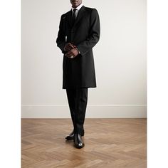 Alexander McQueen's classic trench coat is minimally detailed with the signature harness strap at one shoulder. It's been tailored in Italy from warm wool-twill and has a slim fit that layers well over collared shirts and lightweight sweaters. Timeless Black Formal Outerwear, Classic Outerwear With Structured Boning For Business Casual, Black Outerwear With Structured Boning And Lapel Collar, Classic Gabardine Blazer For Business, Classic Black Wool Coat With Concealed Fastening, Formal Gabardine Outerwear With Notch Lapel, Black Business Outerwear With Structured Boning, Elegant Black Outerwear With Structured Boning, Tailored Gabardine Blazer For Formal Occasions