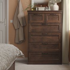 a bedroom scene with focus on the dresser