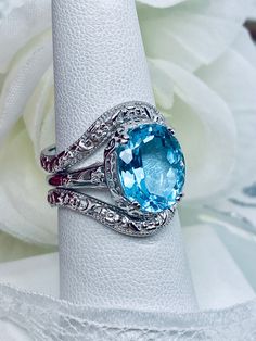 Blue Oval Diamond Ring With Gemstone Accents, Blue Diamond Ring With Gemstone Accents, Oval Shape, Blue Diamond Cut Rings, Elegant Blue Oval Stackable Rings, Blue Aquamarine Diamond Cut Rings, Blue Aquamarine Ring For Anniversary, Blue Oval Stackable Rings For Anniversary, Sapphire Rings With Diamond Accents And Aquamarine, Blue Rings With Diamond Accents For Anniversary