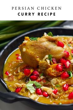 chicken curry recipe with pomegranates and green beans in a black bowl