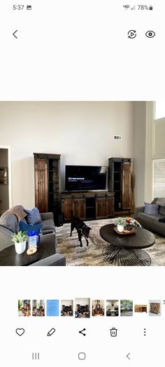 a living room filled with furniture and a flat screen tv on top of a wooden entertainment center