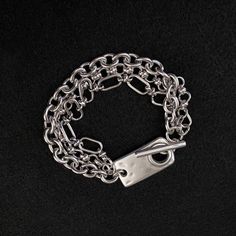 Silver electroplated brass and stainless steel, specialty chain bracelet with silver plated, hammered, ID tag toggle clasp - Silver electroplated brass & stainless steel, mixed specialty chain - three strands - Silver plated, hammered, Zamak, toggle focal clasp - Lead & Nickel safe *Really pretty - better than the photo displays! Adjustable Silver Tarnish-resistant Chain Bracelet, Silver Metal Chain Bracelet, Tarnish Resistant, Silver Metal Chain Bracelet Tarnish Resistant, Silver Tarnish-resistant Metal Charm Bracelet, Modern Hammered Metal Bracelets, Modern Silver Charm Bracelet Tarnish Resistant, Silver Link Bracelets Tarnish Resistant, Silver Link Bracelet Tarnish Resistant, Hammered Metal Bracelets