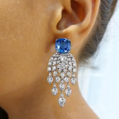 Women Earring, Luxury Jewelry, Heritage Collection, Bridal Earrings, Gift For Women, Bridesmaid Gift, Unique Earring, Party Wear Earrings, Anniversary Gift, Antique Earrings 💍 𝐏𝐑𝐎𝐃𝐔𝐂𝐓 𝐃𝐄𝐓𝐀𝐈𝐋𝐒 💍 ➡ Base Metal : 925 Sterling Silver ➡ GemStone : Sapphire ➡ GemStone Creation : Lab-Created ➡ Diamond : Cubic Zirconia ➡ Earrings Length : 50MM ➡ We use AAAAA+ Grade quality stones ➡ Plating : Rhodium Plated ➡ Hallmark : Yes / S 925 💍 𝐏𝐑𝐎𝐃𝐔𝐂𝐓 𝐈𝐍𝐂𝐋𝐔𝐃𝐄𝐒 💍 ➡ Earrings ➡ Each Or Luxury Blue Pear-shaped Earrings, Luxury Blue Dangle Chandelier Earrings, Sapphire Dangle Earrings In Fine Jewelry Style, Blue Party Earrings With 17 Jewels, Blue Pear-shaped Diamond Earrings For Gift, Blue Dangle Diamond Earrings For Gifts, Blue Diamond Dangle Earrings For Gifts, Blue Diamond Dangle Earrings As Gift, Sapphire Pear-shaped Earrings For Gift