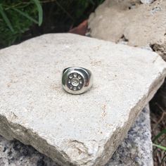 This signet ring is cast in lead-free pewter (Britannia alloy). The ring size when cast is 6. The sealing image is the phases of the moon. This is part of a series of signet rings I am making cast from lead-free pewter. Each ring is hand sculpted to give a unique, rustic style, relief image when used as a seal, with sealing wax. Symbolic Round Hand Cast Signet Ring, Vintage Hand Cast Round Signet Ring, Polished Metal Signet Ring, Vintage Hand-cast Round Signet Ring, Hand Cast Silver Signet Ring, Hand-cast Silver Signet Ring, Adjustable Metal Signet Ring, Symbolic Silver Metal Signet Ring, Symbolic Silver Signet Ring