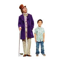 a man in a purple coat and hat standing next to a boy wearing blue jeans