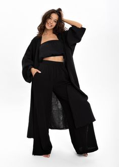 Elevate your style with our Natural Color Pant Set. This Triple Set includes a Kimono, Wide-Leg Trousers, and Croptop, creating a versatile ensemble that's perfect for any occasion. Made from lightweight muslin, these wide-leg trousers provide comfort and style, while the airy Crop Top and Kimono add a touch of boho chic to your wardrobe.  Whether you're heading to the beach or a casual party, this set is your go-to choice for a stylish and relaxed summer outfit. Experience the perfect blend of comfort and fashion with our Lightweight Cotton Boho Pants Set. Upgrade your wardrobe with this stylish Pants Set. DETAILS - Breathable texture. - Minimal Design - Handmade - One size Kimono (please see measurements below) - 3 Sizes pants and crop top ( XS-S, M-L, XL+) - High waist, double split Sli Wide Leg Loungewear Pants Matching Set, Black Straight Pants Set For Spring, Black Spring Sets With Straight Pants, Black Wide Leg Loungewear Set, Black Wide Leg Sets For Spring, Two-piece Wide Leg Loungewear Bottoms, Wide Leg Two-piece Pants For Loungewear, Kimono Set, Soul Sisters Gifts