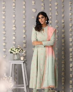 Description: Princess cut anarkali with anchor embroidered flowers all over. Accompanied by churidaar and ombre dupatta with lace all over borderColour Pista GreenFabric ChanderiCare Dry Clean onlyFit Tailored Ombre Dupatta, Princess Cut, Embroidered Flowers, Anarkali, Dry Clean, Lace, Flowers