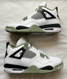 This Jordan 4 Retro Mid Seafoam W sneaker is a must-have for any sneaker enthusiast. With its stylish mid-top design and classic white colorway, this shoe is sure to turn heads. The shoe features a US shoe size of 10.5 and a UK shoe size of 10.5, making it the perfect fit for any woman. The shoe is part of the Air Jordan product line and has a style code of Aq9129-103. It was released in 2023 and has a retro theme. This athletic shoe is perfect for any woman who wants to stay stylish while still being comfortable. Get your hands on this Jordan 4 Retro Mid Seafoam W sneaker today! Nike Shoes Jordans 4 Retro, Jordan Retro 4 Replica, Custom 4s Jordan, Linen Jordan 4, Jordan 4’s Linen, Air Jordan 4 Linen, Shoes For Women Jordan, Sporty White Air Jordan 4 With Abzorb Midsole, Casual Green Jordan Shoes For Light Sports