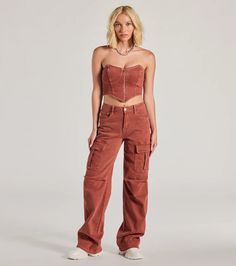 A pair of denim pants that feature a flattering high-rise waist and straight-leg silhouette with trendy cargo pockets and pintuck detailing. Perfect for casual occasions.Fit & FeaturesDenim fabric, minimal stretchHigh-rise waist, cargo pockets, pin tuck detailingStraight-leg silhouetteFront button and hidden zipper closureFive-pocket stylingPants have a 10” front rise with a 32.5” inseamRuns true to size Cargo Denim Pants, Styling Pants, Streetwear Inspo, Denim Crop Top, Corset Tops, Skirts Jeans, Matching Top, Pin Tucks, Black Maxi Dress