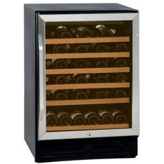 the wine cooler has many bottles in it