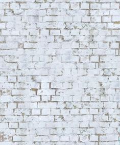 an old white brick wall textured with paint