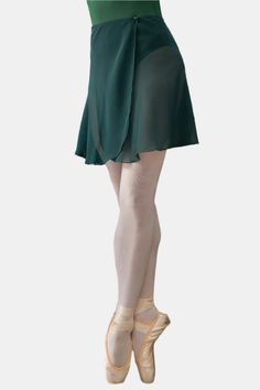 The MP345 green wrap dance short skirt is perfect for use during your rehearsals or ballet classes. Designed to complement any dancer beautifully, this ballet skirt is made of Georgette, a sheer fabric that drapes elegantly on the body. Same length front and back Length based on the size (S 38 cm - M 41 cm - L 44 cm) Wrap skirt Press button not sewn, to be sewn based on your measurements Material: Georgette Handmade ballet skirt Made in Italy by Atelier della Danza MP For the best care, we recommend handwashing it in cold water and allowing it to air dry. Size guide Small: waist from 54 cm (21.25 in) to 62 cm (24.4 in) Medium: waist from 63 cm (24.8 in) to 76 cm (29.9 in) Large: waist from 77 cm (30.3 in) to 90 cm (35.4 in) About Atelier della Danza MP's Skirts Our skirts are handcrafted u Ballet Skirts, Lace Leotard, Mesh Leotard, Ballet Classes, Lycra Shorts, Ballet Tights, Tank Leotard, Long Sleeve Leotard, Wrap Shorts