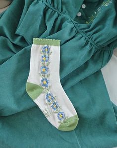 Women's Size 5-9. A vertical blossom design, inspired by 1950's Germanic embroidery design. Truly timeless, and appreciated by all floral sock lovers. Material: Cotton polyester blend Flower Socks, Sock Lovers, Floral Socks, Spring Lookbook, Style Socks, Sock Drawer, Socks Gift, Blossom Design, Women Socks