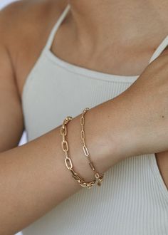 The Paperclip Link Chain Bracelet is essential to your fine jewelry collection. Style with a timeless tennis bracelet or vintage inspired cobra chain. 14k solid gold—always Weight: 1.7g Width: 3mm Lobster clasp closure North Star Necklace, Link Chain Bracelet, Broken Chain, Domed Ring, Madewell Jeans, Yellow Gold Chain, Pearl Charms, Fine Jewelry Collection, Pearl Stud Earrings