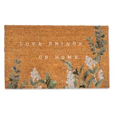 a door mat with the words love, feelings and flowers on it in white lettering