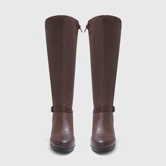 a pair of women's brown boots with zippers on the side and heel