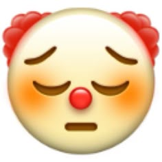 the face of a clown with red hair and eyes closed is shown in an emoticive style