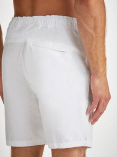 Our Sydney shorts in white are cut for a regular fit for the perfect, warm weather ready style. We have developed a mid-weight, beautifully soft and breathable pure linen that will keep you cool and comfortable in even the hottest of conditions. This made in Italy fabric is finished by being piece-dyed before construction for a bright and vibrant pure white. The Sydney short features a curved back yoke for a great fit and an elasticated waistband with drawcord for comfort. The front of the short White Bermuda Shorts With Built-in Shorts For Vacation, Casual White Bermuda Shorts For Vacation, White Bottoms With Built-in Shorts And Relaxed Fit, White Bermuda Bottoms For Beach, White Bottoms With Straight Hem For Summer, White Short Pants With Elastic Waistband, White Bermuda Bottoms With Pockets, White Bermuda Shorts For Summer Vacation, White Bermuda Shorts For Spring Vacation