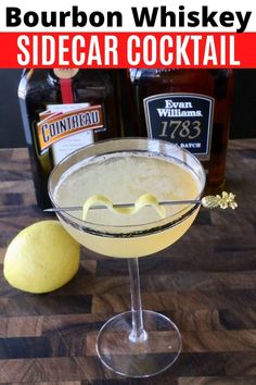 the bourbon whiskey sidecar cocktail is served in a coupe glass with a lemon garnish