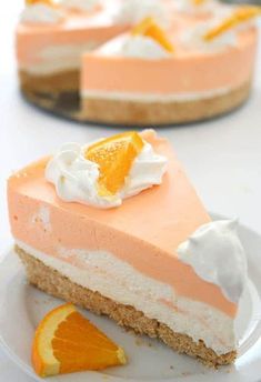 a slice of orange cheesecake on a white plate