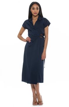 Show off sophisticated style in a surplice wrap midi dress fashioned with a neatly spread collar and O-ring tie closure. Spread collar Cap sleeves True wrap style with side tie closure 100% polyester Machine wash, line dry Imported Model stats: 5'10" height, 32" bust, 25" waist, 36" hip. Model is wearing size 2. Formal Summer V-neck Belted Dress, Evening Belted Wrap Dress With Short Sleeves, Evening Wrap Dress With Short Sleeves And Belt, Evening Wrap Dress With Belt And Short Sleeves, Chic Faux Wrap Midi Dress For Work, Chic Short Sleeve Wrap Dress For Evening, Chic Evening Wrap Dress With Short Sleeves, Formal Short Sleeve Wrap Dress With Tie Waist, Chic Formal Faux Wrap Dress