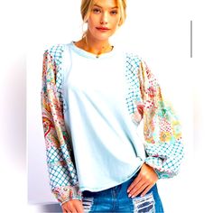 Ls Mix Print Mineral Washed Top -Rounded Neckline -Mix Print Sleeves -Long Sleeves -Elastic Cuffs -Loose And Relaxed Fit -Small Measurements : Length - 24.75" & Bust - 25.5" Fabric: Knit Content: 100% Cotton Made In: Imported New Boutique Item * Casual Light Blue Patchwork Tops, Light Blue Patchwork Cotton Top, Casual Cotton Top With Balloon Sleeves, Blue Patchwork Crew Neck Top, Casual Spring Tops With Balloon Sleeves, Casual Multicolor Balloon Sleeve Tops, Casual Balloon Sleeve Tops For Spring, Trendy Blue Top With Balloon Sleeves, Trendy Blue Balloon Sleeve Tops