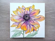 a drawing of a yellow and purple flower