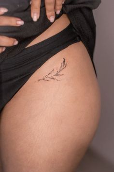 Mini tattoo floral motif small minimalistic thigh tattoo  #tattoo #tattootbilisi #minitattoo #smalltattoo #smalltattooideas #tattooideas Hip Tattoo Small Flower, Upper Thigh Small Tattoo, Thigh Crease Tattoo, Delicate Thigh Tattoo, Small Long Tattoos, Minimal Thigh Tattoo, Dainty Thigh Tattoo Women, Tiny Tattoos Hip