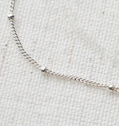 Dainty Beaded Chain Bracelet in Sterling Silver or 14kt Gold Filled Wear this little love singly or layer it with other bracelets. It just goes perfectly with everything! Have it handmade in your choice of sterling silver or 14kt gold filled. MEASURING YOUR WRIST: Please your wrist before purchasing. To find your wrist size, measure the skin tight (but not pinching) circumference of your wrist over your wrist knuckle. Then add an inch to find your approximate bracelet size. You can also measure Dainty Adjustable Silver Chain Bracelet, Minimalist Adjustable Charm Bracelet With Delicate Chain, Adjustable Silver Charm Bracelet With Delicate Chain, Silver Charm Bracelet With Delicate Adjustable Chain, Silver Adjustable Charm Bracelet With Delicate Chain, Sterling Silver Delicate Chain Bracelet, Adjustable Delicate White Gold Bracelet, Silver Minimalist Charm Bracelet With Delicate Chain, Adjustable Delicate Chain Bracelet