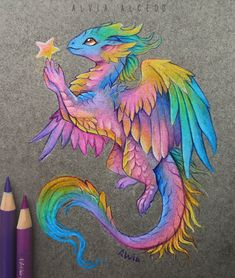 a drawing of a dragon with wings and a star in its hand, next to some colored pencils