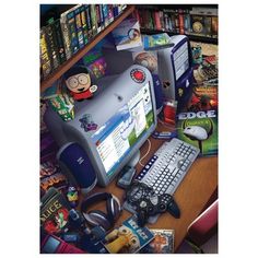 an image of a computer with many games on the desk and bookshelves in the background