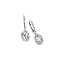 Add sparkle to any look with these lab-grown diamond earrings. Crafted in bright 14-karat white gold  these dangle earrings feature an oval diamond surrounded by a shimmering halo. Additional diamond accents along the front of the secure lever back closure round out this luxe look. Luxury Lab Grown Diamond Halo Earrings, White Gold Bridal Dangle Earrings With Halo Design, White Gold Halo Dangle Bridal Earrings, Classic Dangle Earrings With Halo Design, Classic Dangle Diamond Earrings With Halo Design, Classic Dangle Halo Diamond Earrings, White Gold Halo Design Dangle Diamond Earrings, White Gold Dangle Earrings With Halo Design, Halo Drop Diamond Earrings Fine Jewelry