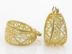 Artisan Collection Of Turkey™ 18k Yellow Gold Over Sterling Silver Open Filigree Hoop Earrings. Measure approximately 1.29"L x .65"W. Saddle backings. Elegant Hinged Huggie Earrings For Gift, Small Hoop Earrings With Intricate Design For Wedding, Elegant Small Hoop Earrings With Intricate Design, Elegant Small Hoop Filigree Earrings, Small Hoop Filigree Earrings For Wedding, Elegant Hoop Jewelry With Intricate Design, Small Hoop Wedding Earrings With Filigree, Small Filigree Hoop Earrings For Wedding, Small Hoop Filigree Earrings As Gift