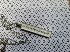 Made from book pages  Steel chain 24 inches Pendant is rectangle  Items are not waterproof Orders with 3 or more items will receive a free gift! Percy Jackson Jewelry, Percy Jackson Necklace, Charm Necklace Diy, Rectangle Pendant Necklace, Percy Jackson Cast, Rectangle Pendant, Percy Jackson Books, Necklace Beads, Percy Jackson Funny