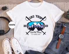 Custom Family Vacation Shirt, Family Ski Trip Tshirt, Matching Skier T-shirt, Winter Sports Outfit, Mountain Tee, Christmas Holiday Gifts HOW TO ORDER: - Please, check and review all the photos. - Select your T-shirt size from the selection box. - Select your T-shirt color from the selection box. - Personalization box is only for design color information, enter your design or text color in the personalization box (see images for options) UNLESS otherwise indicated. - Select the quantity. - Add to cart. - Complete checkout! TSHIRT DETAILS: * All solid colors are 100% cotton * All heather colors are 52% cotton, 48% polyester * Shoulder taping * Side-seamed * UNISEX SIZING, not a Women's size! * Retail fit * Pre-shrunk * Tear away the label PRODUCTION AND SHIPPING PROCESS *The production time White Sublimation Print T-shirt For Outdoor, White Short Sleeve Shirt For Outdoor Activities, White T-shirt With Sublimation Print For Outdoor Activities, White Sublimation Graphic Print For Outdoor, White Tops With Sublimation Print For Outdoor Activities, White Tops With Sublimation Print For Outdoors, White Graphic Print Sublimation Design For Outdoor, Sporty T-shirt With Logo For Outdoor Activities, Sporty Logo Print T-shirt For Outdoor Activities