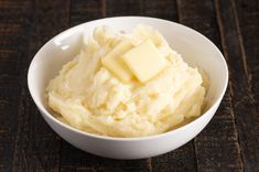 mashed potatoes with butter in a white bowl