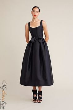 Looking for a special dress to wear to your next big event? Check out the Audrey+Brooks 6221. This gorgeous dress features a scoop neck, bow at the waist, and full midi skirt with crinoline. The hidden back zipper and satin lining make it perfect for a night out on the town. Made from 51% silk and 49% wool, this dress is sure to turn heads. Black Braidmaids Dress, Fitted A-line Evening Dress With Bow, Formal A-line Dress With Satin Bow, Elegant Spring Dress With Satin Bow, A-line Dresses With Bow For Gala, A-line Gala Dress With Bow, Elegant Tea Length Dress With Lined Bodice, Elegant Tea Length Evening Dress For Gala, Elegant Tea-length Evening Dress For Gala