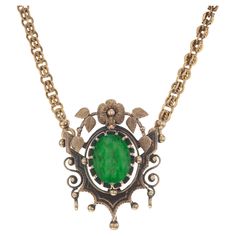 Handmade Victorian antique emerald pendant necklace circa 1860s. 4.50ct oval emerald center stone, set in a natural patina pendant setting. The 19.25 inch chain also has natural patina. There are hidden loops for a drop beneath the Emerald. The chain detaches at the pendant, there is no catch. The GIA has certified the emerald as F1, minor clarity enhancement. 1 oval green Emerald, approx. total weight 4.50cts, F1, GIA certificate #2181881786 Large 12.62 x 9.76 x 6.57mm Length: 19.25 inches 14k yellow gold Tested: 14k Stamped: Not 27.6 grams Width: 3.42mm – Depth: 3.35mm Please Note, we photograph each item as accurately as possible. However due to monitor/mobile device resolution and calibration, we understand some photos may vary in appearance. If you are not satisfied, we offer a 30-day Luxury Ornate Oval Necklaces, Luxury Vintage Oval Pendant Necklace, Emerald Pendant Necklace, Cabin Door, Emerald Necklace Pendant, Gia Certificate, Victorian Gold, Emerald Pendant, Jewel Box