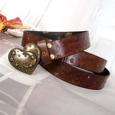 Hand dyed and embossed with antique silver color heart shape moon buckle Made from top quality Italian vegetable tanned leather Material: 100% Real Cow Leather Belt is 3,4 cm in width Buckle antique bronze color How to give your waistline? (look at the last picture!) You can track your order with the tracking number sent to you in any international tracking system. E.g. https://www.trackitonline.com https://www.17track.net For US customers: https://www.usps.com Thanks and happy shopping! Y2k Belts Aesthetic, Cute Belts For Women, Cow Belt, Cute Belts, Unique Belts, Belts Aesthetic, Moon Belt, Heart Belt, Accessory Inspo