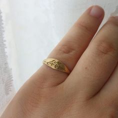 Elegant and unique 14k gold lavender ring, delicate gold signet ring for the stylish bride to be. * Band width: 1.5 mm, wide part width: 5.5 mm* Thickness: 1.5 mm* Available in 14K or 18K YELLOW, WHITE and ROSE gold.   The price listed is for 14K please contact me for 18K pricing.* Sizes vary from 5 US to 9 US, including half sizes.    Please choose your size upon checkout.* Please choose a finish: Shiny or Matte, and mention in note to seller.* This item is handmade, please allow 2-4 weeks of p Dainty Yellow Gold Signet Ring For Gift, Dainty White Gold Signet Ring For Anniversary, Dainty 14k Gold Stamped Signet Ring, Dainty Engraved 14k Yellow Gold Ring, Dainty Engraved Yellow Gold Ring Stamped 14k, Heirloom 14k Gold Initial Ring For Wedding, Dainty 14k Gold Signet Ring, Heirloom Rose Gold Initial Ring For Wedding, Delicate Signet Ring For Promise