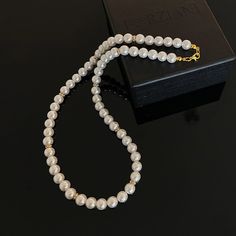 In a world saturated with mediocrity, nothing can rival the authenticity of traditional luxury. This subtly opulent necklace showcases genuine white freshwater pearls, elegantly interspersed with lab diamond studded rondelles in gold. Hand-strung with care in our Orlando studio, this gorgeous necklace is secured with a gold bonded lobster clasp. Our Men's Pearls Collection, features sophisticated fresh water pearl necklaces and bracelets, designed especially for men. Drawing inspiration from his Elegant Gold Rondelle Beaded Necklaces, Luxury Pearl Necklaces With Round Beads, Elegant Round Pearl Chain Beaded Necklace, Elegant Pearl Chain Beaded Necklace, Elegant Pearl Beaded Necklaces With Pearl Chain, Elegant Pearl Beaded Necklace With Pearl Chain, Formal Pearl Beaded Necklaces With Pearl Drop, Formal Pearl Drop Beaded Necklace, Elegant Pearl White Necklace With Pearl Pendant