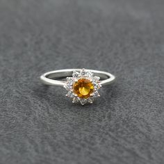 Citrine Birthstone Crystal Ring, Orange Citrine Birthstone Rings, Amber Crystal Promise Ring, Round Orange Topaz Ring Gift, Orange Crystal Ring With Gemstone For Anniversary, Amber Topaz Promise Ring, Orange Topaz Promise Rings, Orange Gemstone Promise Ring, Amber Crystal Ring With Gemstone