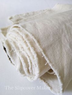 an old white piece of cloth is folded up