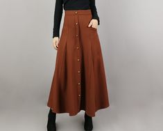 * One maxi wool skirt, fixed waist with zipper on the back. * A-line shape and with bronze color buttons. * Half lined, with one pocket. * Support 7 days return to get full refund on item without any reason. * Can custom size and colors, lead time is 6-8 days; * Let us know your usual size in your country and your overall height. * If you have some specific request or special characters such as broad shoulder, long arms, long waist, etc you think we need pay attention to when making, please let Cheap Brown Skirt For Winter, Affordable Brown Skirt For Spring, Long Taupe Holiday Skirts, Cheap Brown Flared Skirt, Cheap Trendy Brown Skirt, Cheap Brown Midi Skirt, Cheap Brown Skirt For School, Cheap Brown Vintage Skirt, Luxury Brown Workwear Skirt