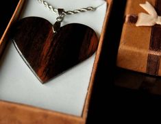 Thank you for checking out Jack&Lady jewelry! Our necklace for women is handmade from sustainable wood, sourced from around the world. We use veneers to make the pendant durable. Minimalistic style with very unique wood, every pendant we made is rare, lightweight has a beautiful finish, and is hypoallergenic. Each wooden pendant is made only with hands, love, and care. ♥ Why you'll love it ♥ ❯ Handmade with love and care, no power tools used. ❯ All our wooden pendants are made with the layer Personalized Brown Necklace For Gift, Handmade Brown Jewelry For Valentine's Day, Heart-shaped Brown Necklace For Gift, Artisan Necklace For Valentine's Day Gift, Brown Heart-shaped Necklace For Gift, Handmade Ebony Necklaces For Gifts, Handmade Ebony Necklace For Gift, Artisan Heart Pendant Necklace As Gift, Artisan Heart Pendant Necklace For Gift