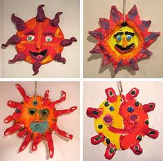 four different pictures of paper mache sun faces