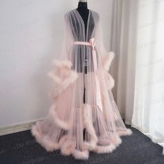 This Is An Elegant, Sexy And Luxurious Sheer Robe With A Feather/Fur Trim And A Gorgeous Satin Tie. This Sheer Gorgeous Gown/Robe Is Perfect For Boudoir And Romantic Moments. You Can Use This Sheer Feather Peignoir With Beautiful Marabou Boas For You Wedding Day, Dancing, Photoshoot Or Romantic Evenings. High Quality Tulle And Marabou Feathers With A Satin Ribbon At The Waist. Perfect For Use As Lingerie Or As A Bridal Robe. Color: Light Pink Size: S/M Runs Large ... This Was Custom Fit For A 5' Feather Bridal Robe, Unique Boho Wedding Dress, Pijama Satin, Fancy Robes, Bridal Fur, Wedding Scarf, Sheer Robe, Bridal Robe, Boho Wedding Dress Lace