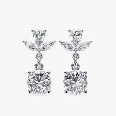 Introducing our exquisite 1.15 CT Dangle Stud Lab Grown Diamond Earrings, a perfect blend of sophistication and modern style. These earrings feature a stunning arrangement of marquise and round-cut diamonds, meticulously set to dangle gracefully. Crafted in luxurious 14k gold with a secure pushback closure, these dangle drop earrings offer both elegance and comfort. Ideal as a dazzling birthday gift or a special treat for her, these earrings are designed to captivate and charm, making every mome Marquise Brilliant Cut Bridal Earrings For Anniversary, Marquise Bridal Earrings With Diamond Accents For Anniversary, Bridal Marquise Earrings With Diamond Accents For Anniversary, Diamond Cut Drop Earrings For Anniversary, Classic Marquise Bridal Earrings As Gift, Anniversary Diamond Drop Earrings Matching Set, Classic Dangle Earrings For Celebration, Elegant Marquise Earrings For Anniversary, White Gold Dangle Cluster Earrings Fine Jewelry